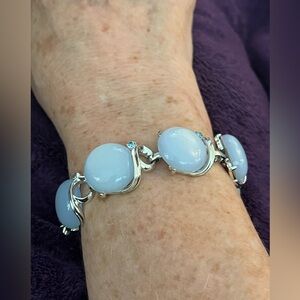 Silver bracelet with light blue opalite stones. 7” long. EUC.
